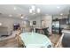 The well-equipped kitchen connects to a cozy dining area and a comfortable living room, perfect for entertaining at 490 Pentas Ln, Haines City, FL 33844