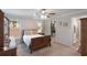 Comfortable main bedroom with a walk-in closet and an en-suite bathroom, offering privacy and convenience at 490 Pentas Ln, Haines City, FL 33844