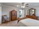 Comfortable main bedroom with a walk-in closet and an en-suite bathroom, offering privacy and convenience at 490 Pentas Ln, Haines City, FL 33844