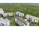Overhead view of condos surrounded by lush green mangroves and waterways at 5300 S Atlantic Ave # 5507, New Smyrna Beach, FL 32169