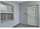 Condo entrance with door number 5507, a window and neutral paint at 5300 S Atlantic Ave # 5507, New Smyrna Beach, FL 32169