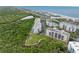 Aerial view of the beach side condos in a park-like setting at 5300 S Atlantic Ave # 5507, New Smyrna Beach, FL 32169