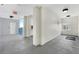 Hallway featuring an exit sign, several doors, and a view of the sky at 5300 S Atlantic Ave # 5507, New Smyrna Beach, FL 32169
