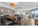 Open floorplan with a large kitchen featuring a breakfast bar and view of the dining room at 5300 S Atlantic Ave # 5507, New Smyrna Beach, FL 32169
