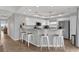 Eat-in kitchen featuring a breakfast bar with seating and stainless steel appliances at 5300 S Atlantic Ave # 5507, New Smyrna Beach, FL 32169