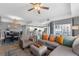 Inviting living room open to the kitchen and dining area with access to balcony at 5300 S Atlantic Ave # 5507, New Smyrna Beach, FL 32169