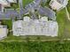Overhead view of flat condo roof, air conditioning units and surrounding parking lot at 5300 S Atlantic Ave # 5507, New Smyrna Beach, FL 32169