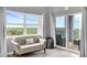 Cozy seating area with lots of windows and views of the lush scenery outside at 5300 S Atlantic Ave # 5507, New Smyrna Beach, FL 32169