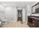Bathroom featuring vanity with dark wood cabinets, tile flooring and neutral paint at 5672 Parkview Lake Dr, Orlando, FL 32821