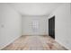 Bedroom featuring unique tile floors, neutral paint, and a closet at 5672 Parkview Lake Dr, Orlando, FL 32821