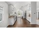 Bright kitchen with white cabinets, stainless steel appliances, granite countertops, and natural light from the bay window at 5672 Parkview Lake Dr, Orlando, FL 32821