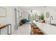 Bright open concept kitchen and living area with modern furnishings at 6834 Wilson Hammock Ave, Groveland, FL 34736