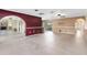 Spacious open-concept living room with tile flooring, a ceiling fan, and access to the patio at 7249 Abbey Ln, Winter Park, FL 32792
