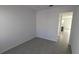 Bright and airy bedroom featuring tile floors and neutral walls at 7612 Danube Rd, Kissimmee, FL 34746