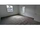 Bright bedroom with neutral carpet and window with view at 7612 Danube Rd, Kissimmee, FL 34746
