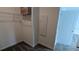 Walk-in closet featuring wire shelving for optimal storage at 7612 Danube Rd, Kissimmee, FL 34746