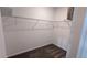 Walk-in closet featuring wire shelving for optimal storage at 7612 Danube Rd, Kissimmee, FL 34746