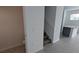 Entryway and stairs, conveniently located near the kitchen at 7612 Danube Rd, Kissimmee, FL 34746