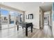 Spacious game room features a foosball table and access to a covered outdoor patio at 7740 Sandy Ridge Dr # 216, Reunion, FL 34747