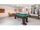 Game room with a pool table and dart board, perfect for entertaining at 7760 Indian Ridge N Trl, Kissimmee, FL 34747