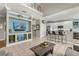 Open concept living room and kitchen, featuring modern decor and neutral finishes at 8522 Blue Horizon Ct, Kissimmee, FL 34747