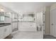 Well-lit bathroom featuring a soaking tub, glass shower, and tile floors at 8522 Blue Horizon Ct, Kissimmee, FL 34747