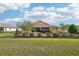 Well-maintained backyard and landscaping around a single-story home at 8932 Sw 101St Cir, Ocala, FL 34481