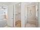 Modern bathroom featuring an open walk-in shower, a large vanity, and natural light at 8932 Sw 101St Cir, Ocala, FL 34481