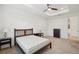 Bedroom featuring a tray ceiling, carpet and natural light at 8932 Sw 101St Cir, Ocala, FL 34481