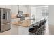 Stylish kitchen featuring stainless steel appliances, granite countertops, and plenty of cabinets at 8932 Sw 101St Cir, Ocala, FL 34481