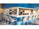 Outdoor wet bar with seating, ideal for entertaining and enjoying outdoor living at 8944 Sydney Ave, Kissimmee, FL 34747