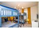 Quirky ' bedroom with blue bunkbeds and a playful Minion-themed wallpaper design at 8944 Sydney Ave, Kissimmee, FL 34747