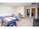 Upstairs game room with air hockey table, TV, and seating area at 8944 Sydney Ave, Kissimmee, FL 34747