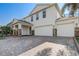 Lovely two-story home with a three-car garage, stone accents and brick paver driveway at 10231 Lenox St, Clermont, FL 34711