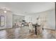 Bright, open-concept living and dining area, with tile flooring and plenty of natural light from large windows at 10231 Lenox St, Clermont, FL 34711