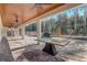 Spacious screened-in patio with a wood ceiling, perfect for outdoor dining and entertaining at 10231 Lenox St, Clermont, FL 34711
