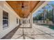 Spacious screened-in patio with a stunning wood ceiling and views of the backyard swimming pool at 10231 Lenox St, Clermont, FL 34711