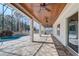 Beautiful screened-in patio featuring a wood ceiling and a lovely view of the pool at 10231 Lenox St, Clermont, FL 34711