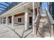 Covered patio with outdoor ceiling fans provides a comfortable and inviting space at 10231 Lenox St, Clermont, FL 34711