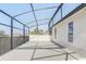 Spacious screened patio with views to the side and backyard allows enjoyment of Florida outdoor living at 10231 Lenox St, Clermont, FL 34711