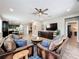Spacious living room featuring tile floors, comfortable seating, and natural light at 1086 Calla Lily Cv, Oviedo, FL 32766