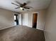 Spacious bedroom featuring carpet flooring and ample closet space at 1089 S Hiawassee Rd # 323, Orlando, FL 32835
