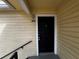 Close-up of front door with unit number and surrounding architecture at 1089 S Hiawassee Rd # 323, Orlando, FL 32835