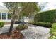 Secluded backyard features a patio area, privacy hedges, and a tranquil landscaping at 1184 Fern Ave, Orlando, FL 32814