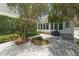 Charming backyard space with privacy landscaping, perfect for relaxation and outdoor entertaining at 1184 Fern Ave, Orlando, FL 32814