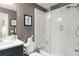 Cozy bathroom with a shower-tub combo, modern vanity, and decorative wall art at 1184 Fern Ave, Orlando, FL 32814