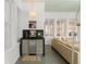 Stylish coffee bar with modern appliances and sleek design complements the nearby living area at 1184 Fern Ave, Orlando, FL 32814