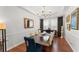 Formal dining room with hardwood floors, chandelier, and wainscoting at 1184 Fern Ave, Orlando, FL 32814