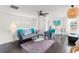 Inviting living room with stylish furniture, a glass coffee table, and large windows at 1184 Fern Ave, Orlando, FL 32814
