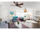 Well-decorated living space featuring a comfortable seating area and a view of the sleeping area at 1184 Fern Ave, Orlando, FL 32814